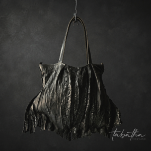 BORSA PELLE TRAFORATA PROVOCATION MILANO.